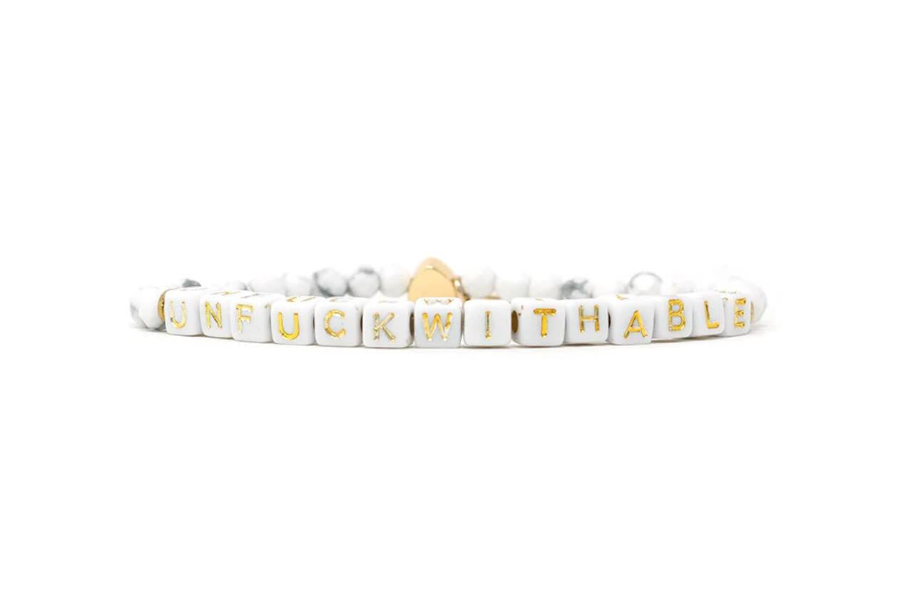 Tiny UNFUCKWITHABLE bracelet in Howlite
