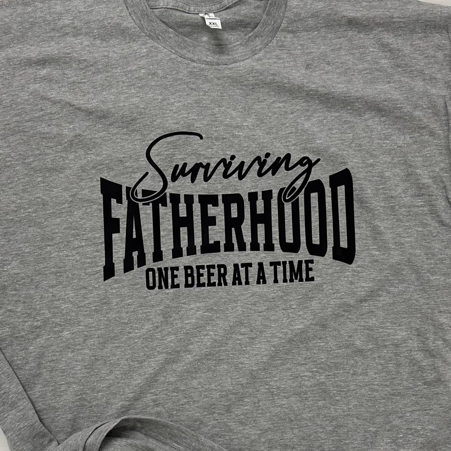 Surviving Fatherhood Graphic Tee